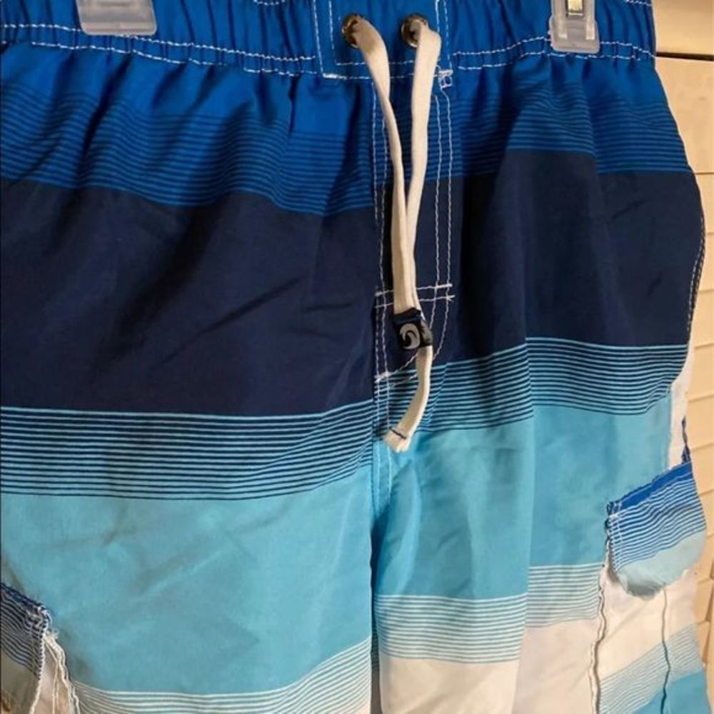 B. Split Men’s Swim Trunks